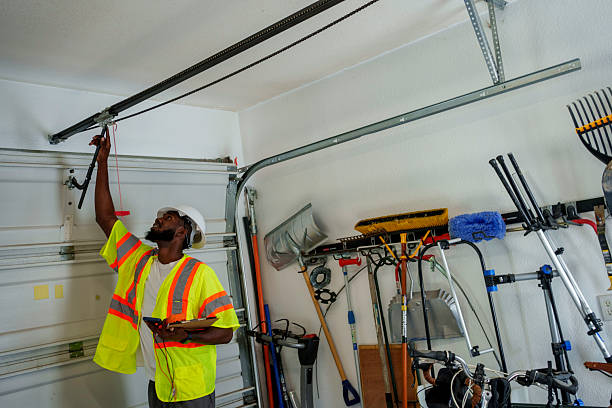 Professional Garage Door Panel Replacement technician working in Newport, OR